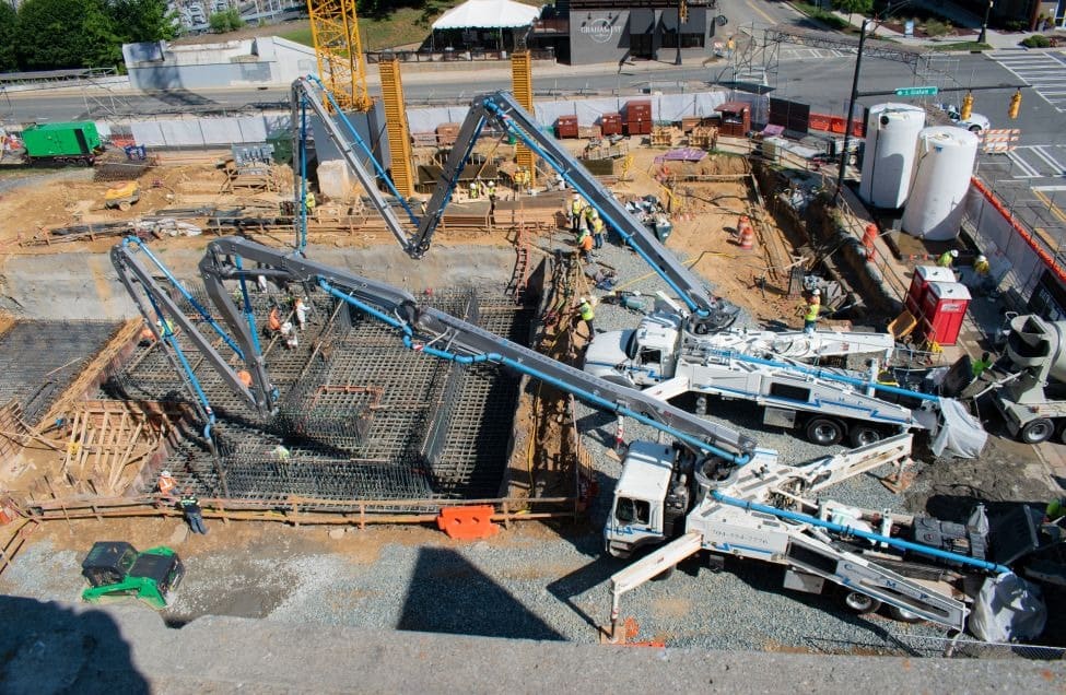 Concrete pump on job site